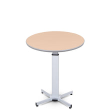 Float of the Stand Steady height adjustable round table without props on it.