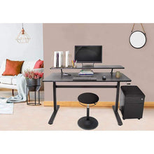 Lifestyle image of the Stand Steady Active Motion Wobble Stool in a home office setting.