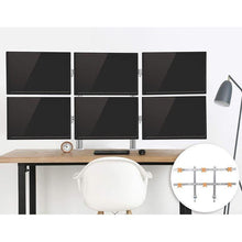 Silver | six-monitors | Lifestyle image of the Stand Steady 6 Monitor Mount.