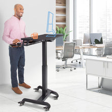 Black | Lifestyle image of the black Stand Steady Cruizer Premier in an office setting.