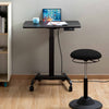 Lifestyle image of the Cruizer mobile podium in a home office plugged into a wall.