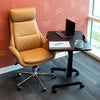 Lifestyle image of the Cruizer electric mobile podium in an office setting.