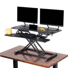 black | none | 37-inch-desktop | FlexPro Hero 37" shown with two monitors, at its tallest height.