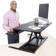 black | 32-inch-desktop | The FlexPro Premier 32" electric standing desk converter features two spacious desktop levels.