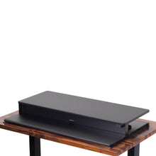 black | 40-inch-desktop | Black 40" electric standing desk converter at tallest setting with no props.