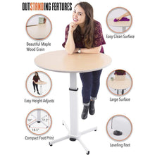 Stand Steady Round Table is easy to clean, height adjustable, has a compact footprint, leveling feet, large surface, and a beautiful maple wood grain