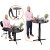 Featuring a pneumatic foot pedal, the Stand Steady Round Table allows for easy height adjustments.