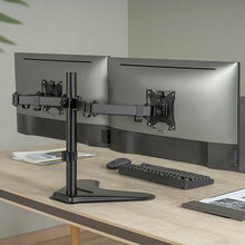 Black | Two-monitors | Lifestyle image of the dual monitor mount in an office setting.