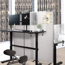Lifestyle image of the Stand Steady kneeling chair in an office workspace.