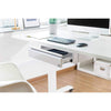 White | Lifestyle image of the Stand Steady desk drawer attached to a desk, open.