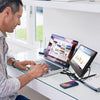 Lifestyle image of person using the SideTrak portable monitor in an office setting.