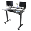 black | black-shelf | With a clamp on shelf and attachable wheels, the Tranzendesk electric standing desk with built-in power outlets is ideal for any workspace.