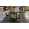 Lifestyle image of the Tubstr extra large utility cart in a warehouse setting.