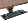 Screw-on under desk tilting keyboard tray by Stand Steady.