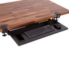 Stand Steady Premier Heavy Duty Clamp-On Keyboard Tray with props on it.