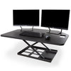 Black | This spacious black desktop has plenty of room for all of your wrokplace necessities including multiple monitors, a laptop, keyboard, and more.