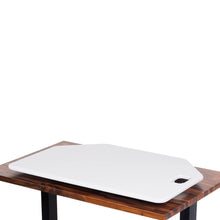 White | The desk converter, shown in white, can lay nearly flat on your desk.